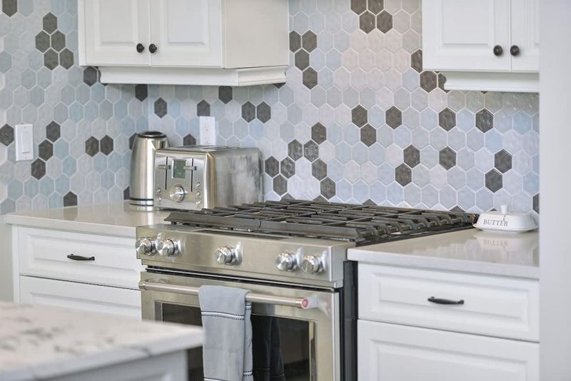 Fully equipped modern kitchen with amazing views on the main floor.