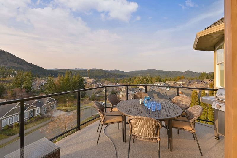 Main level decks with amazing views of the Bear Mountain Resort and Mount Finlayson.