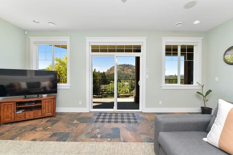 Well appointed family room on the lower floor with amazing views.