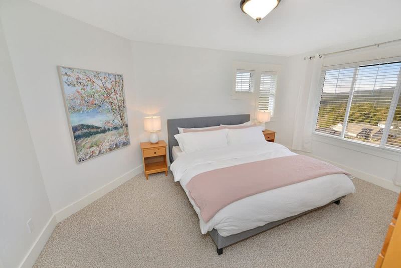 Top floor fourth bedroom with king bed.