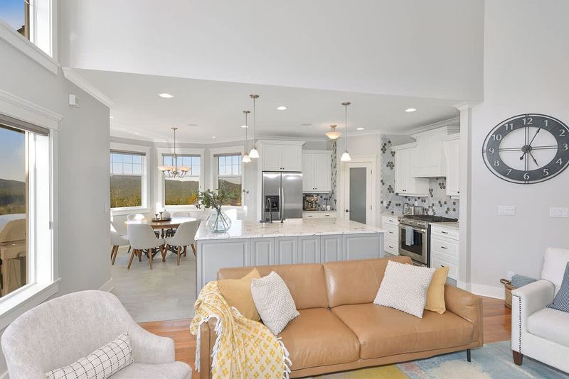 Fully equipped modern kitchen with amazing views on the main floor.