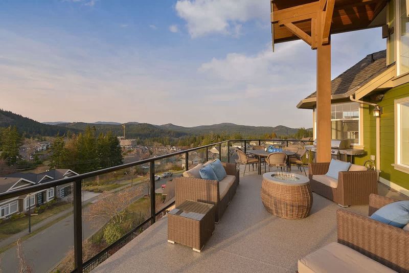 Main level decks with amazing views of the Bear Mountain Resort and Mount Finlayson.