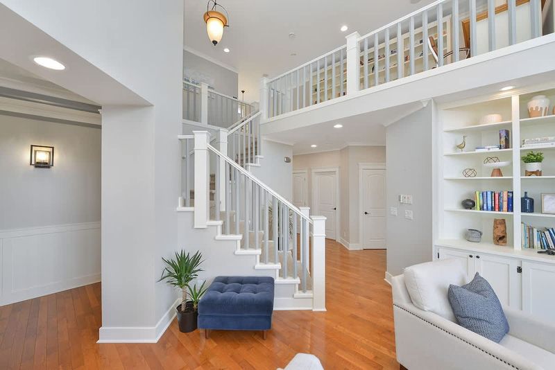 Main level staircase to the upper floor bedrooms.