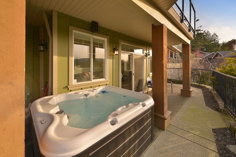4 person hot tub with views on the lower floor with incredible views.