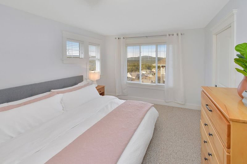 Top floor fourth bedroom with king bed.