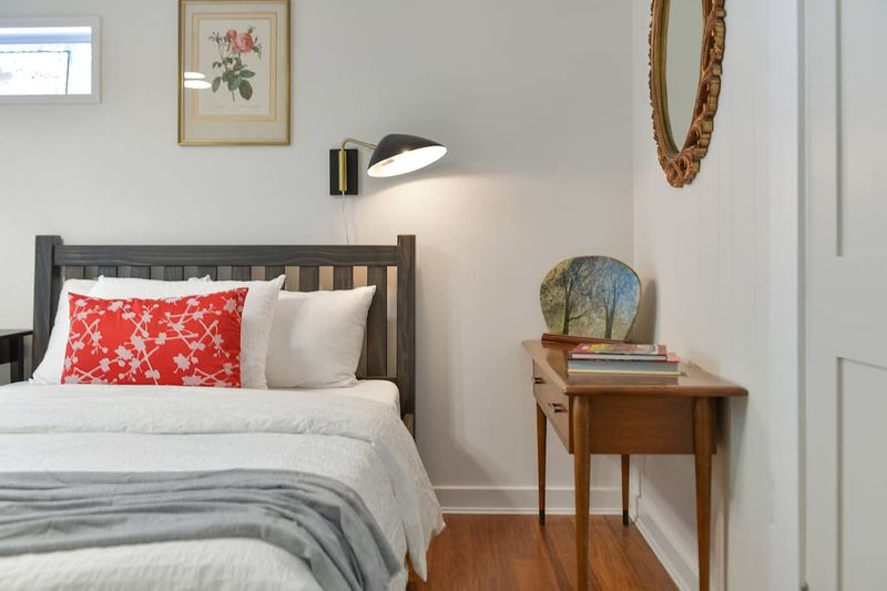 Second bedroom in the main cottage with two double beds.