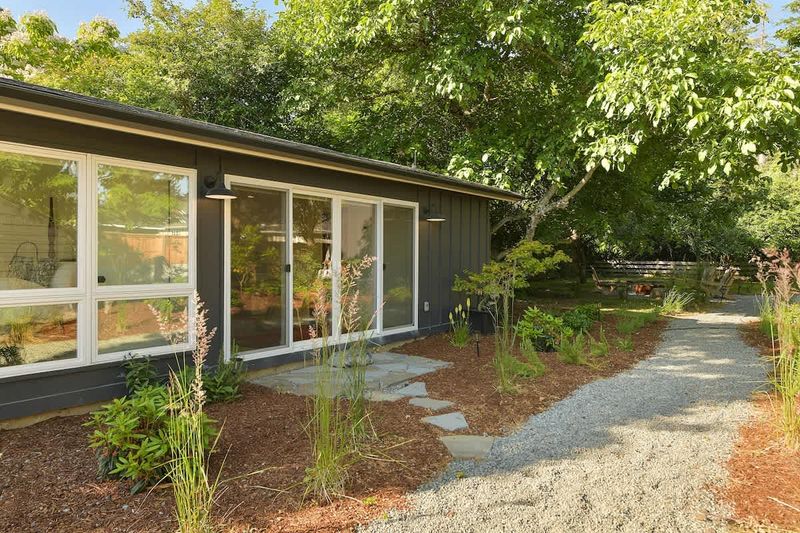Outside the second private bedroom cottage with king bed and breakfast bar plus coffee and tea bar.