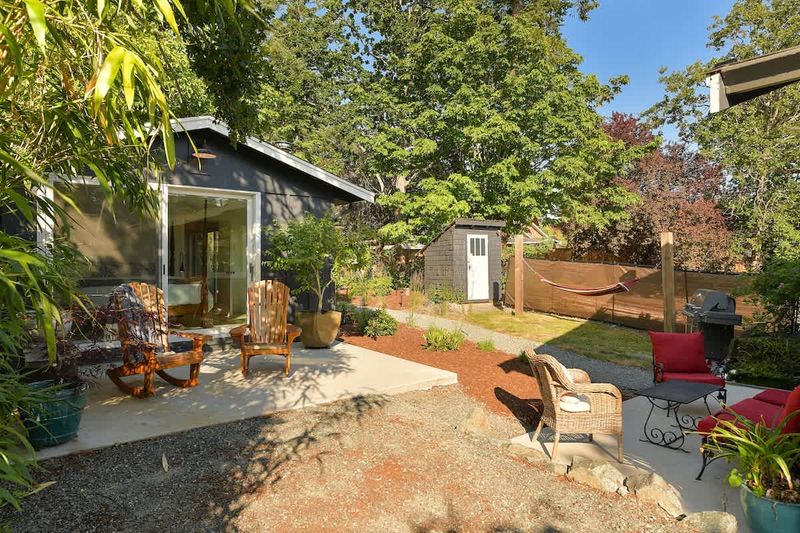 Outside the second private bedroom cottage with king bed and breakfast bar plus coffee and tea bar.