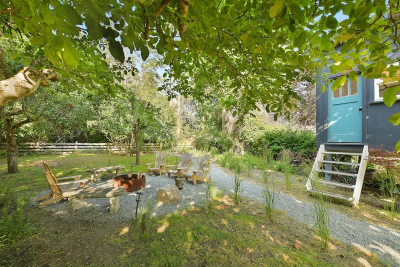 Backyard living and garden spaces. Please note that there is open burning bans seasonally thus the firepit use may not be available.