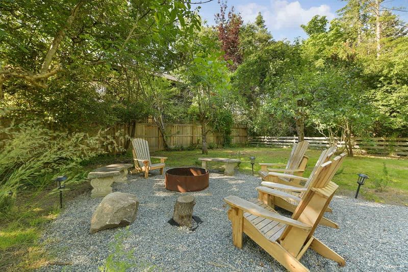 Backyard living and garden spaces. Please note that there is open burning bans seasonally thus the firepit use may not be available.