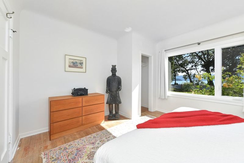 Primary bedroom in the main cottage with king bed.