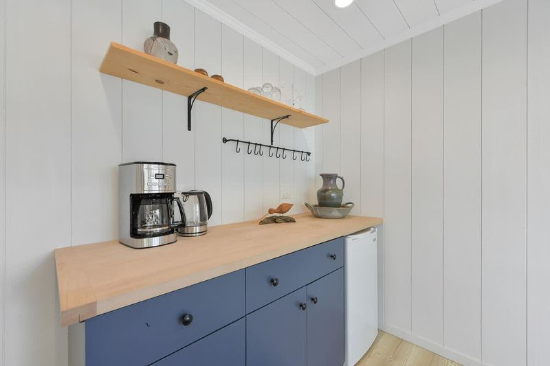 Second private bedroom cottage with king bed and breakfast bar plus coffee and tea bar.