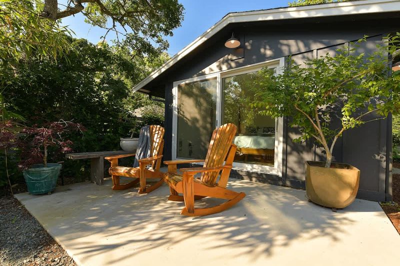 Outside the second private bedroom cottage with king bed and breakfast bar plus coffee and tea bar.