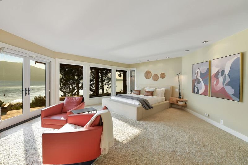 Immaculate primary bedroom with sweeping views and incredible ensuite.