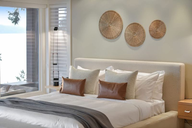 Immaculate primary bedroom with sweeping views and incredible ensuite.