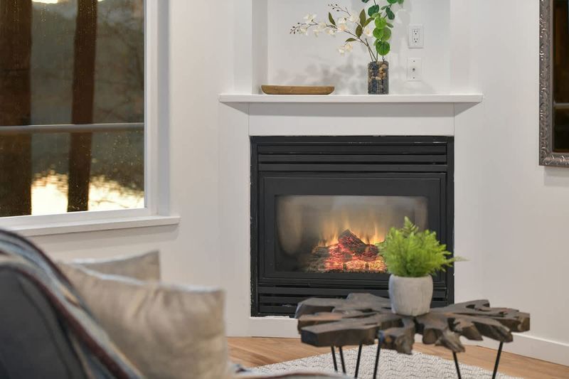 Main level addition living space near kitchen and dining room.