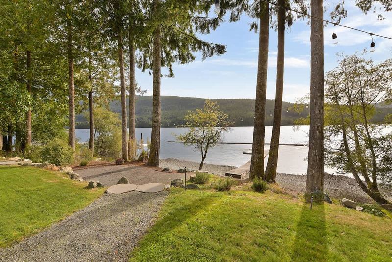 Lakeside beach and private dock.