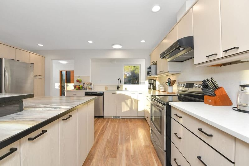 Main level fully equipped modern kitchen.