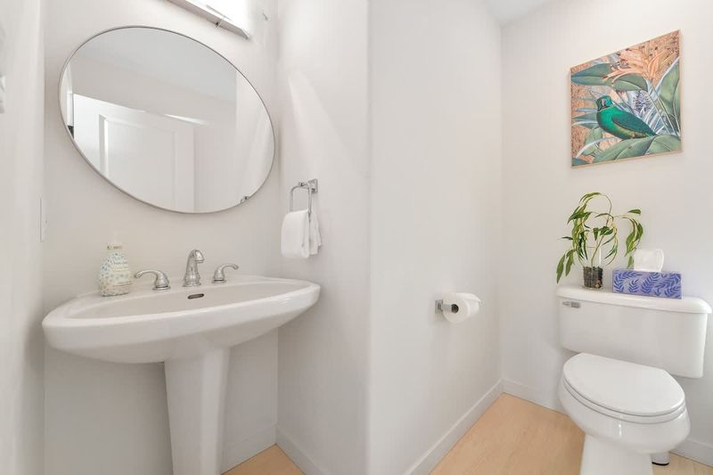 Main level powder room bathroom 1