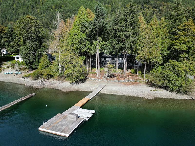 Lakeside private dock and beach.