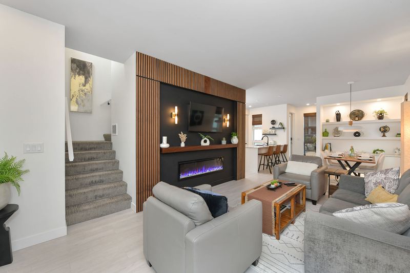Living Room, Looking towards Dining and Kitchen, Stairs on the left lead to the upstairs bedrooms