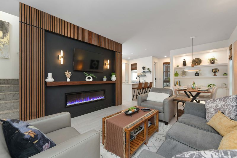 Living room, looking towards dining table and Kitchen area.