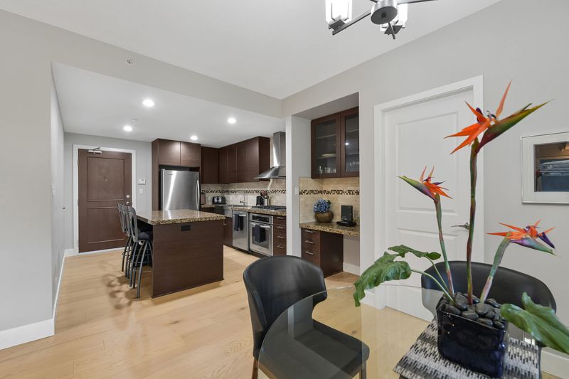 Open plan dining and kitchen space.