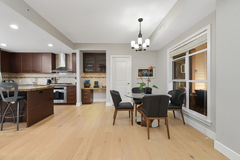 Open plan dining and kitchen space.