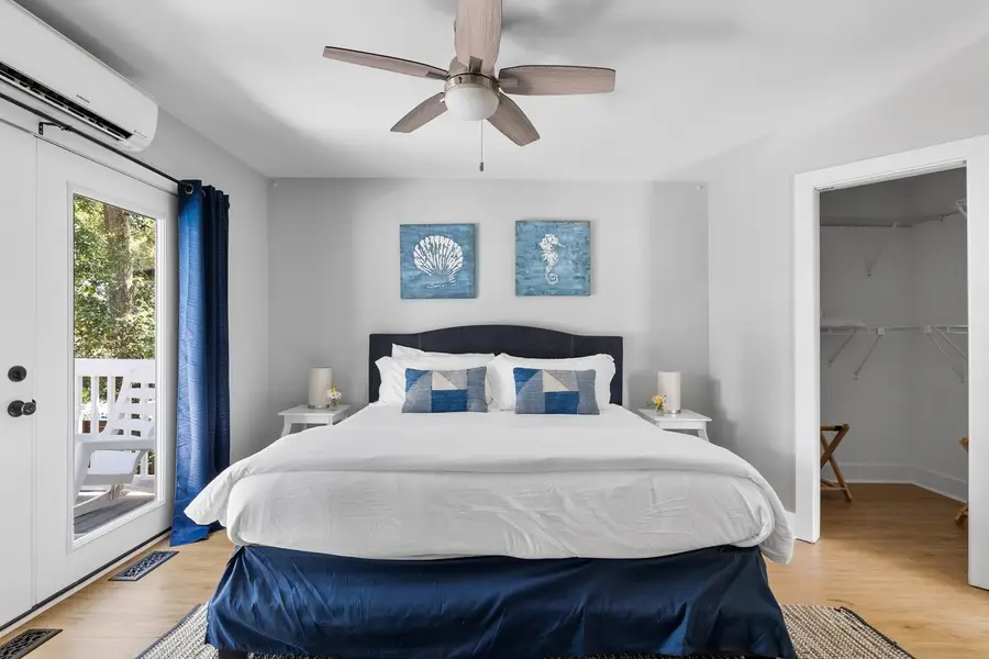 Bedroom 1: King Bed + Ceiling Fan & TV