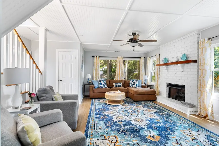 Spacious living room with plenty of seating for your group