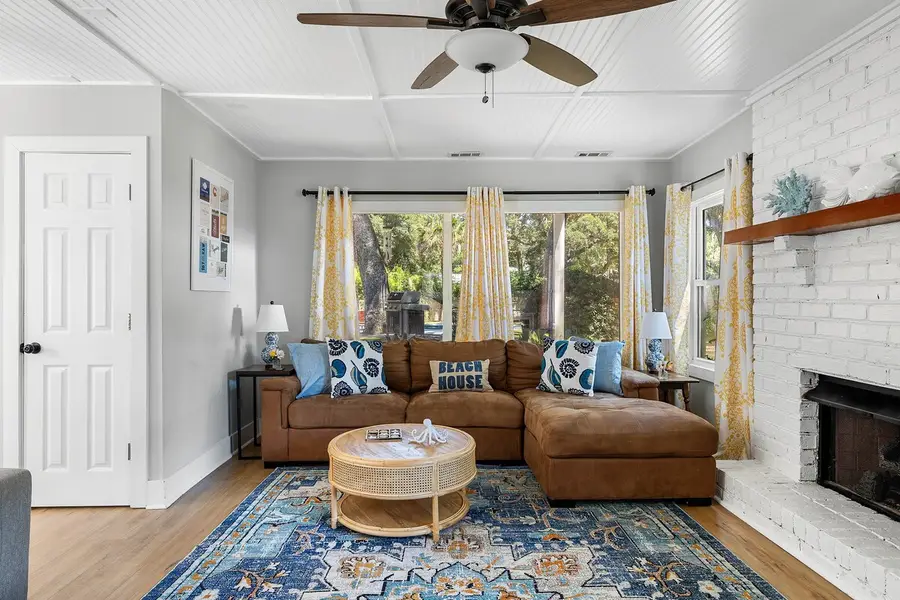Spacious living room with plenty of seating for your group