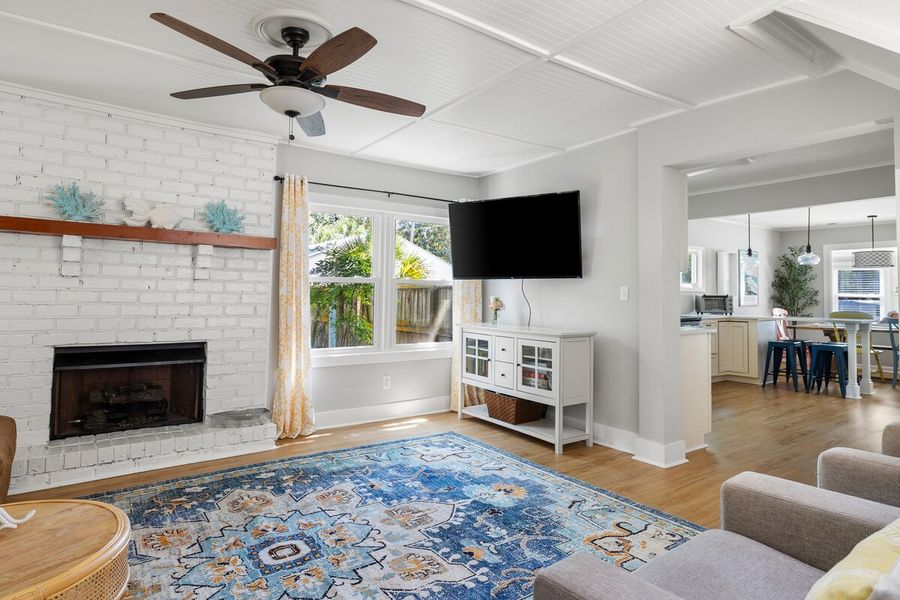 Spacious living room with TV
