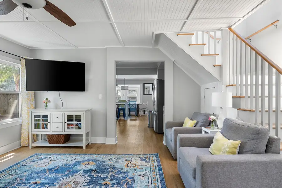Spacious living room with plenty of seating for your group