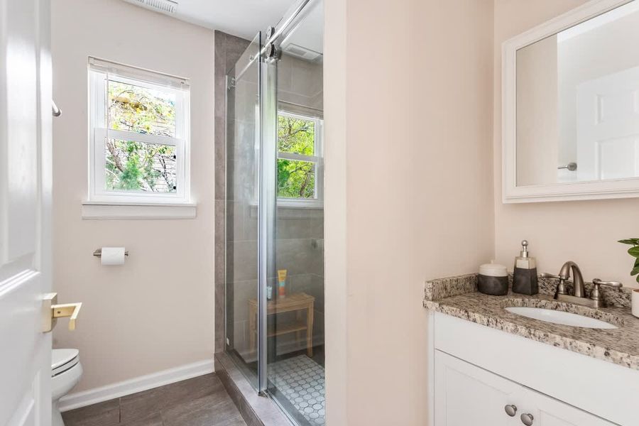 Full bathroom with walk-in shower 