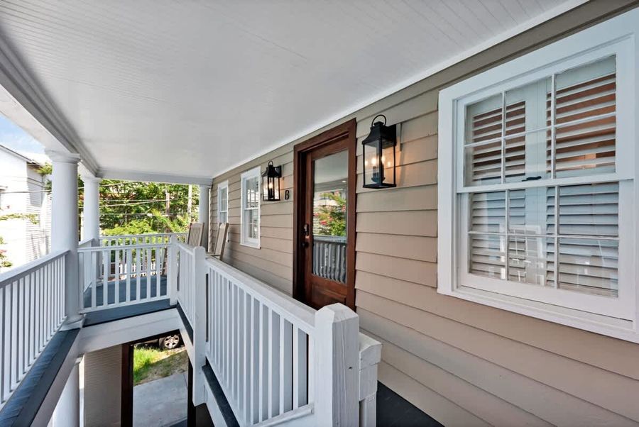 Catch a breath of fresh air on the charming front porch.