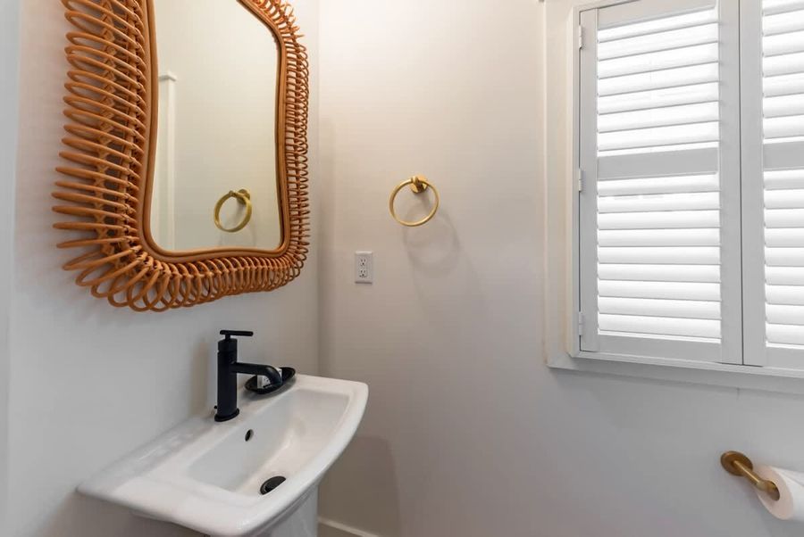The convenient half bath is accessible from the living area.
