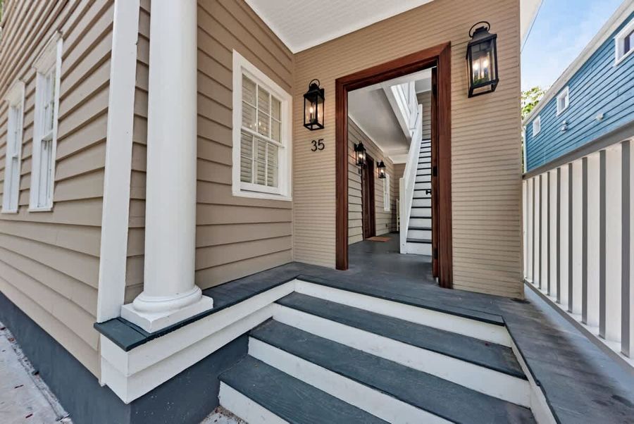 Hop across four stairs and enter your Charleston relaxation oasis.