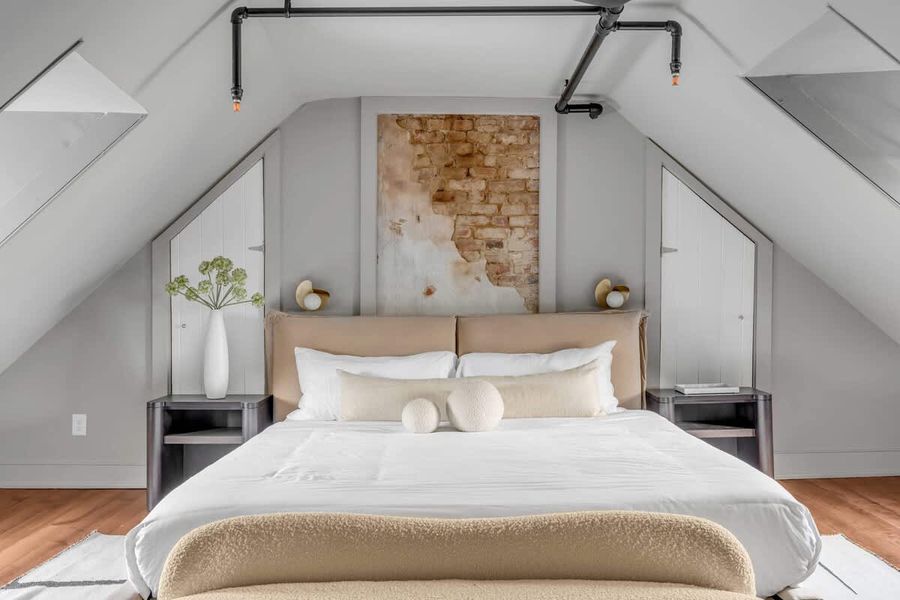 Large bedrooms with plush linens await.