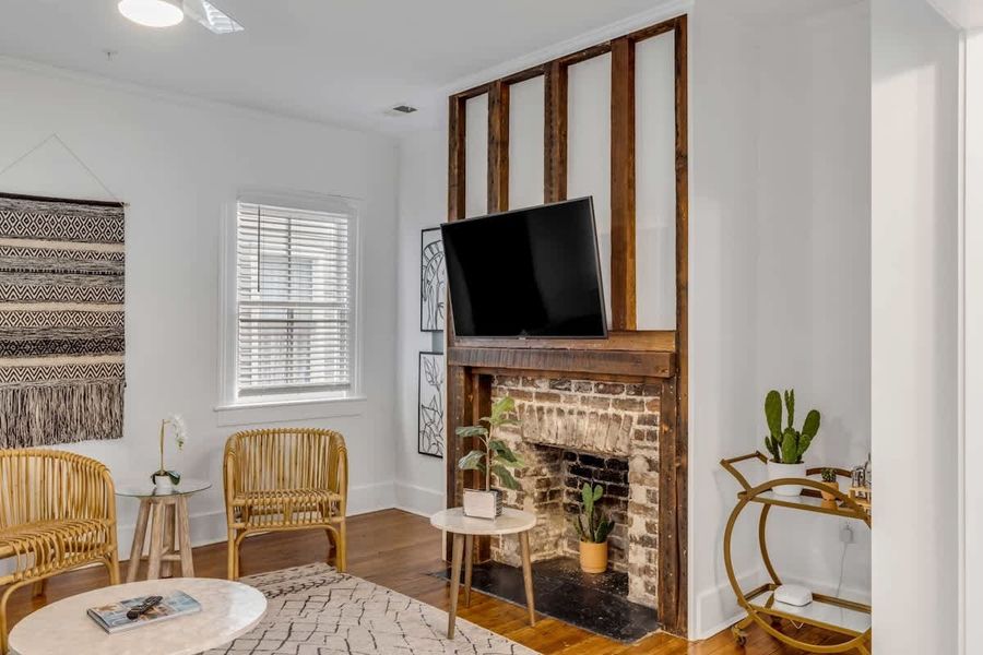 Living Room with exposed beams and fire place 
