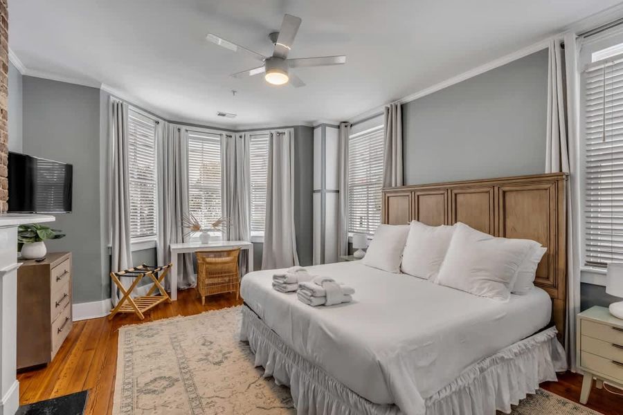 Bedroom with king bed and desk 
