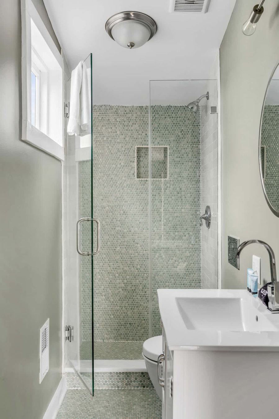Bathroom 2: Modern bathroom featuring a spacious walk-in shower.
