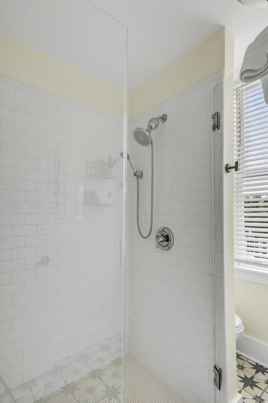 Bathroom 1: Refresh and unwind in the spacious bathroom with walk-in shower.