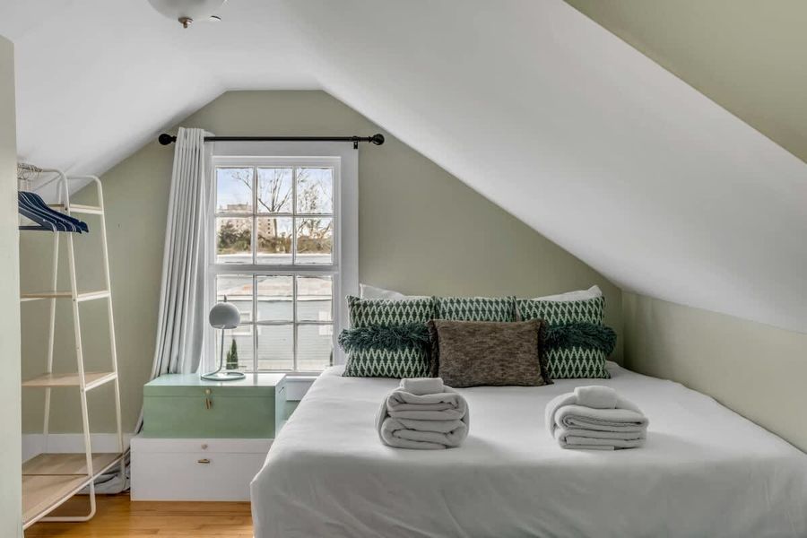 Bedroom 3: Cozy queen bedroom designed for a restful night's sleep.