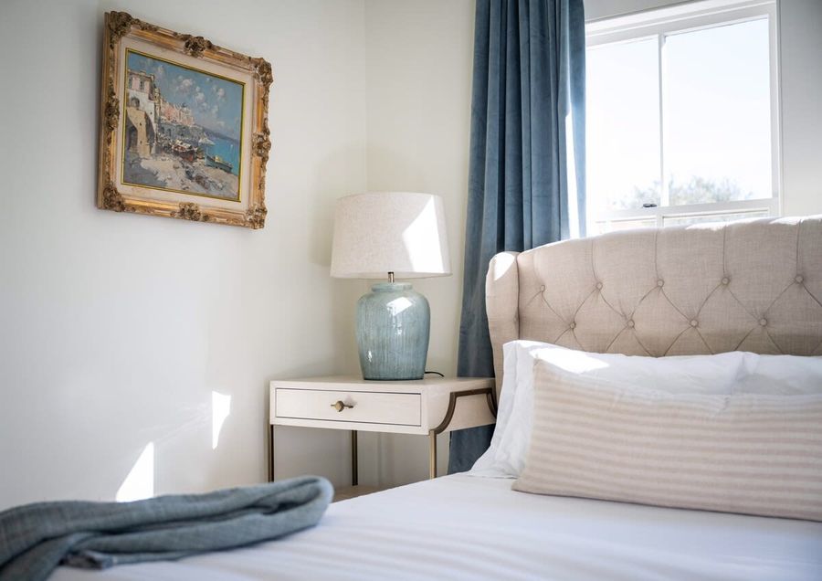 Bedroom #1 with a Queen Bed, en-suite, private balcony & desk