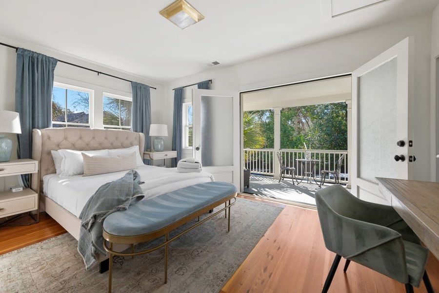 Bedroom #1 with a Queen Bed, en-suite, private balcony & desk