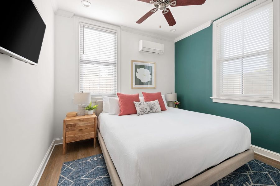 Bedroom #1: King Bed + TV + Ceiling Fan + En-suite Bathroom