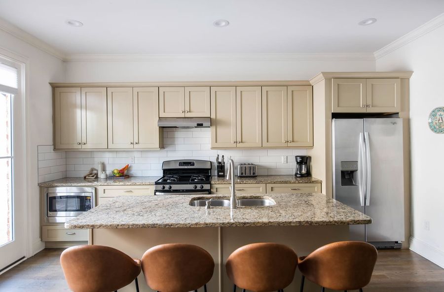 Open floorplan living room with kitchen, and dining area