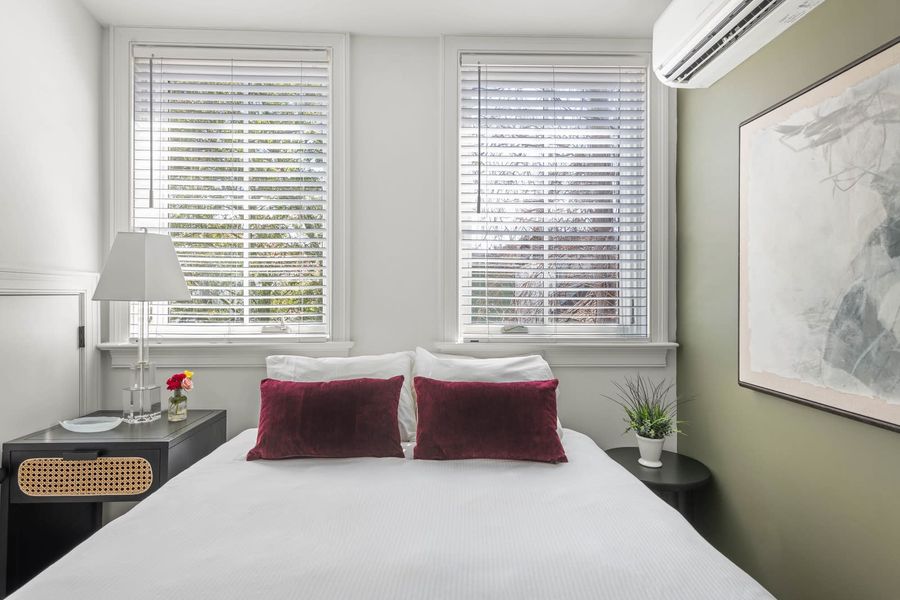 Bedroom #1: Queen Bed + TV + Ceiling Fan + En-suite Bathroom