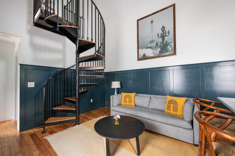 The living room allows relaxation space for your group with a sofa bed