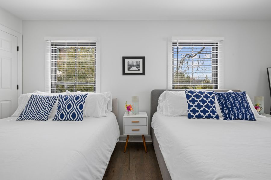 Bedroom #5: Two Queen Bed + Queen Bed + 2 Futons